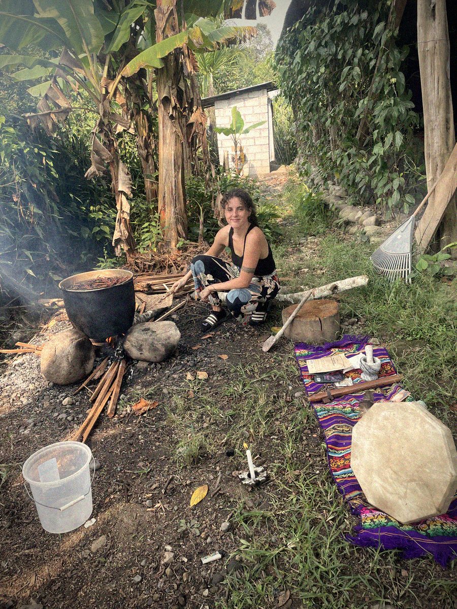 Alora preparing medicine by fire