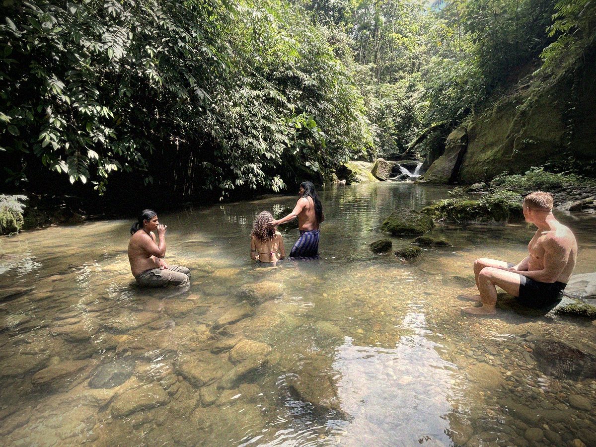 River bath ceremony in the jungle